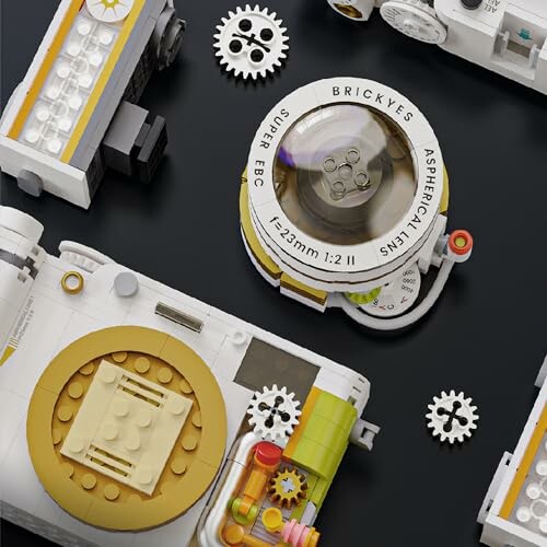 Verschiedene LEGO-Kamerateile auf schwarzem Hintergrund.